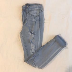 light wash blue ripped jeans